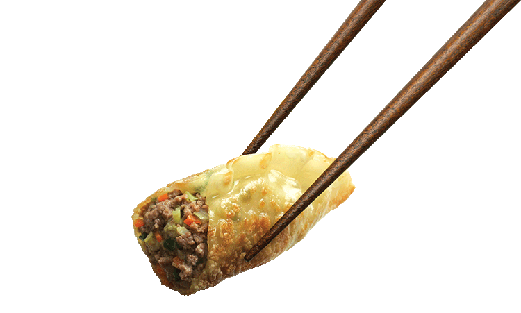 chopsticks holding a dumpling