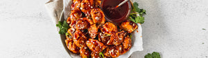 Sweet and Spicy Gochujang Glazed Mini Wontons